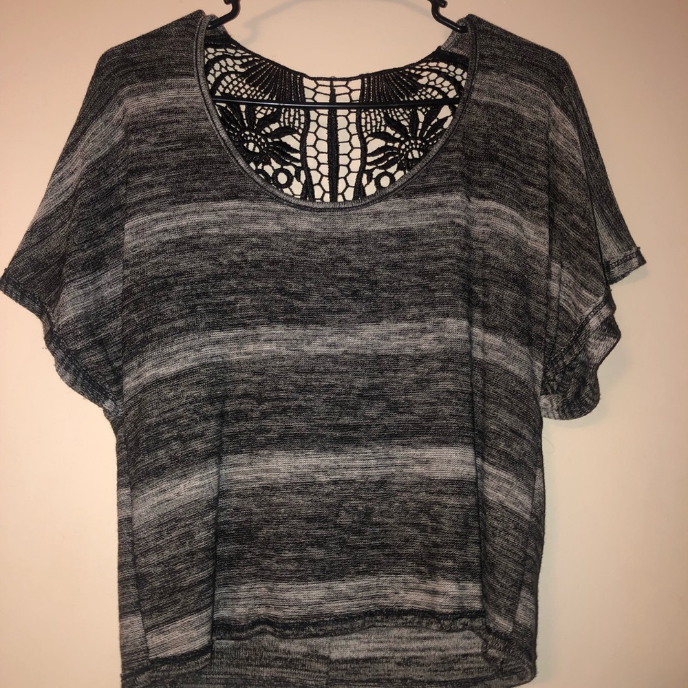 A black blouse. With a lacey design in the back